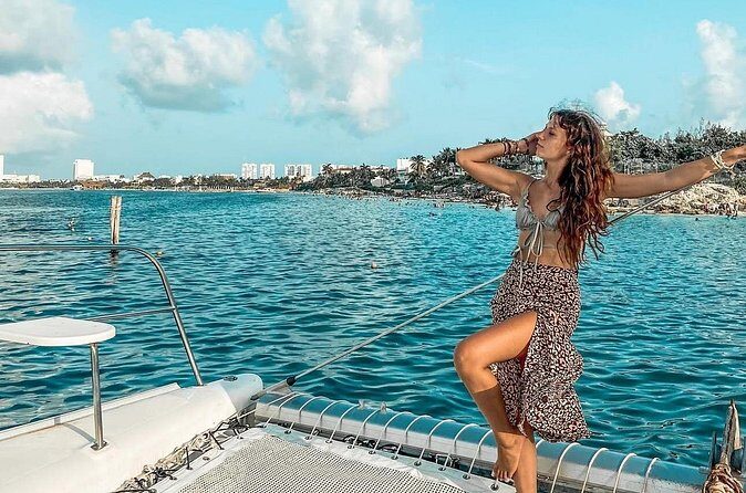 Isla Mujeres Catamaran Tour with Snorkeling Spinnaker and Lunch - The Sum Up