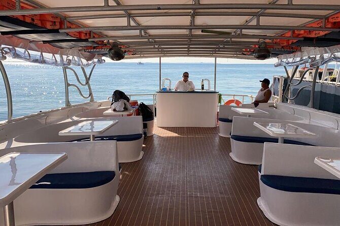 Isla Mujeres Tour in Private Catamaran with Food & Drinks - Arrival on Isla Mujeres: Exploring at Your Own Pace