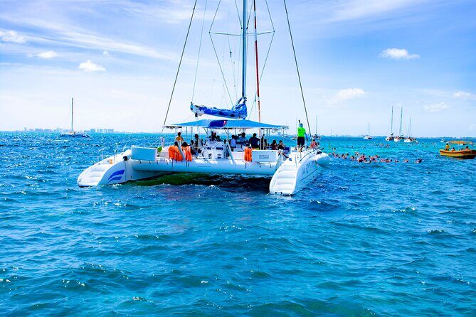 Isla Mujeres Tour on Catamaran with Snorkel, Open Bar, Buffet & Beach club - The Pros and Cons: What Travelers Experience