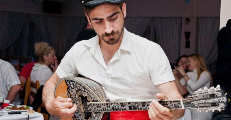 Kamari: Greek Show, Buffet Dinner, and Drinks at Dimitris - A Detailed Breakdown of the Experience