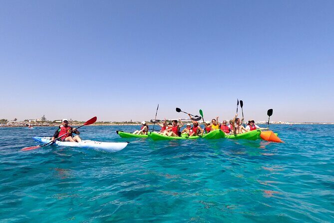 Kayak and canoe tour to Roca Vecchia and La Grotta della Poesia - Exploring the Roca Vecchia Kayak Experience: What You Can Expect