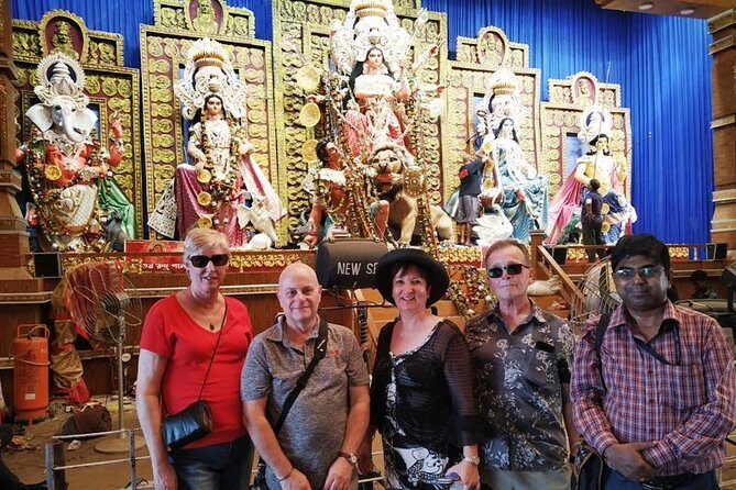 Kolkata Full Day Sightseeing Including Mother House, Kumortuli and Flower Market - Mother House: A Place of Peace and Reflection