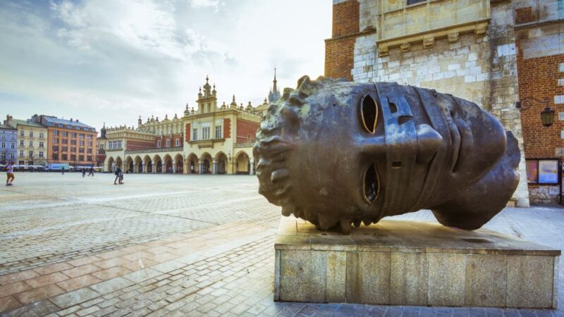 Krakow: Old Town Audio-Guided Walking Tour with Headset - Authentic Stories and Hidden Secrets