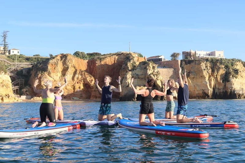 Lagos: Sunrise SUP Yoga Experience at Praia dos Estudantes - Key Points