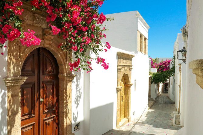 Lindos Day Cruise from Rhodes Town with Swimming stops and Hotel Transfers - Exploring Lindos Village