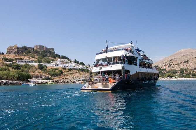Lindos Full Day Boat Tour with Swimming - The Return Journey and Overall Atmosphere