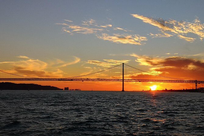 Lisbon Sunset Sailing Tour on Luxury Sailing Yacht with 2 Drinks - Key Points