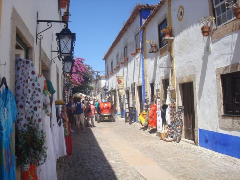 Lisbon to Porto stop Óbidos, Nazaré, Fátima, Coimbra, Aveiro - Authentic Experiences and Genuine Insights