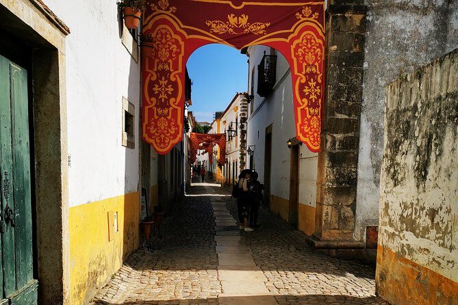 Lisbon to Porto Up To 5 Stops Óbidos Nazaré Fátima Coimbra Aveiro - Who Should Book This Tour?