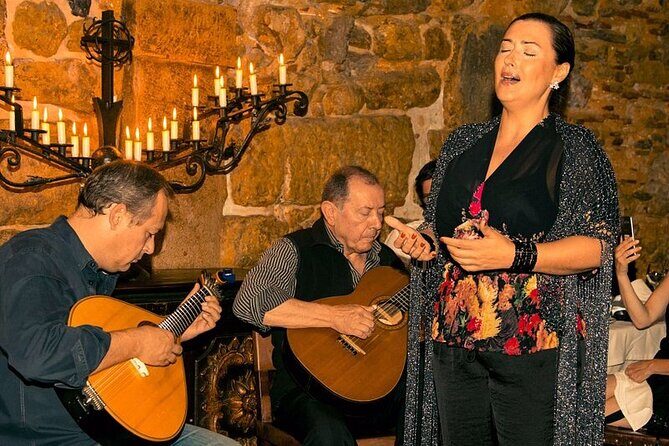 Live Fado Show with Traditional Dinner and Lisbon by Night - Key Points
