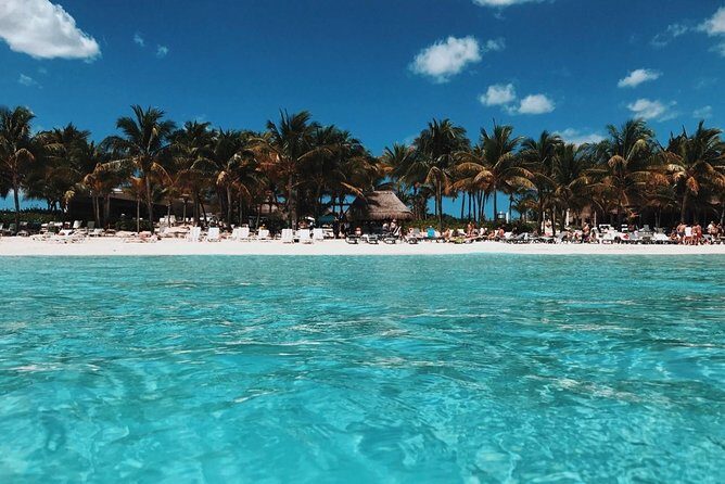 Live this unique experience. Catamaran to Isla Mujeres Tour. Open Bar included. - What Travelers Can Expect: The Real Deal