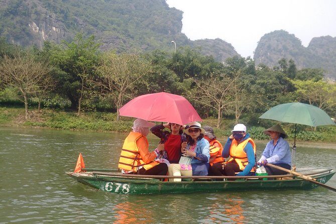 Luxury Bai Dinh - Trang An - Mua Cave with Buffet Lunch - Navigating Trang An Grottoes: An Exciting Boat Ride