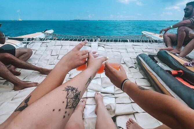 Luxury Catamaran to Isla Mujeres, Snorkeling, Buffet and Ice Bar - Sunset Return to Cancun