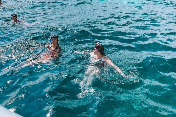 Luxury Catamaran to Isla Mujeres, Snorkeling, Buffet and Ice Bar - Transportation, Group Size, and Value