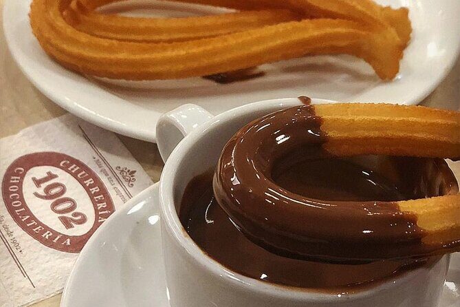 Madrid Bike Tour with Churros and Wine, Ham, and Cheese Upgrade - An Engaging Itinerary with Rich Highlights