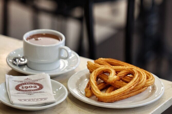 Madrid Bike Tour with Churros and Wine, Ham, and Cheese Upgrade - Authenticity and Quality