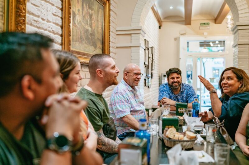 Madrid: Food & Wine Tour with 10 Tapas & 4 Drinks Included - Key Points