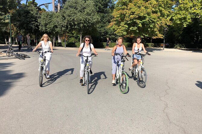 Madrid Retiro Park and Literary Quarter by Bike - The Glass Palace and Lake