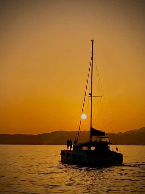 Majorca: Dinner aboard a private catamaran with snorkeling and paddle surfing - Exploring the Itinerary