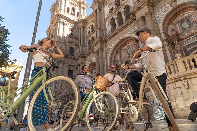 Málaga City Highlights Guided Vintage Bike Tour - Key Points