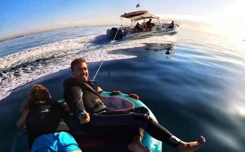 Mallorca: Private Watersports Boat. LUNCH Drinks SUP, Tubing - Key Points