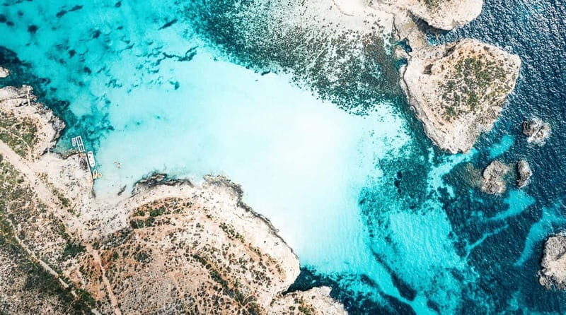 Mellieha: Round Comino, Blue Lagoon & Gozo Cruise with Water - The Sum Up