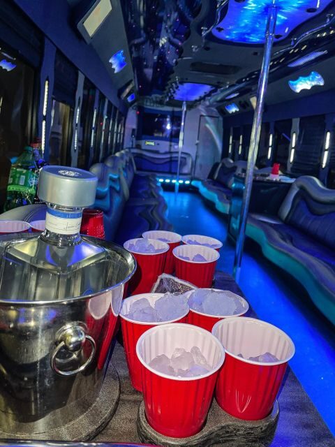 Miami Pool Tour with premium open bar & Party Bus Experience - Key Points