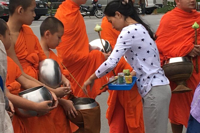 Morning Alms to monks, Doi Suthep temple, Hidden temple & Chiang Mai city views. - Who Should Book This Tour?