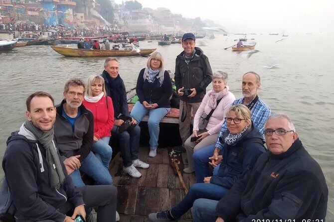 Morning Boat with old part of city - The Sum Up