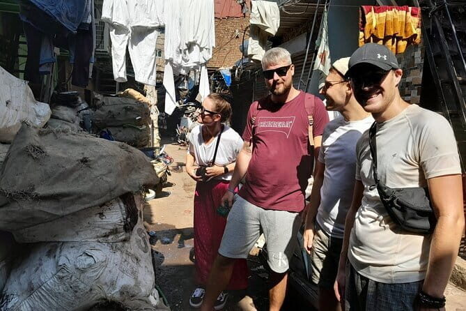 Mumbai Slum Dhobi Ghat and Train Ride Tour with a Local Guide - The Sum Up