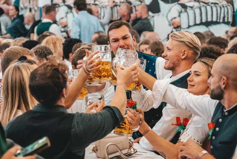 Munich: Guided Oktoberfest Experience with Seats and Beer - The Reserved Seating and Food & Drink Vouchers