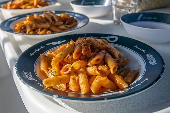 Mykonos Catamaran Delos Rhenia Cruise with Lunch and Transfer - Discovering the Mykonos Catamaran Delos Rhenia Cruise: A Complete Guide