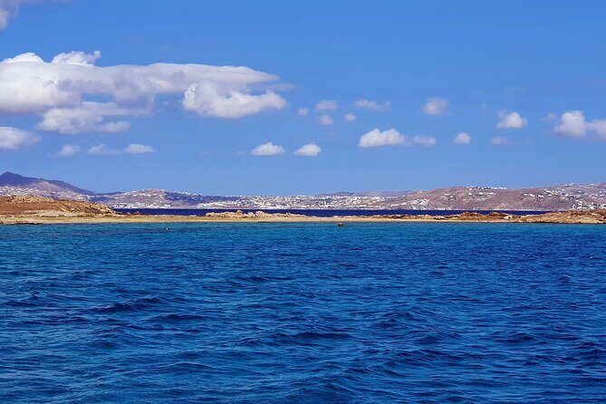 Mykonos Catamaran Delos Rhenia Cruise with Lunch and Transfer - Rhenia: The Tranquil Escape