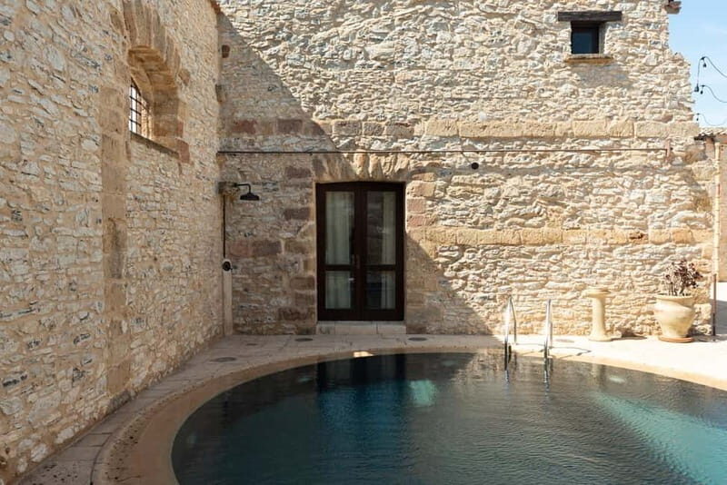 Nature and relaxation by the pool at Baglio Passofondo Estates - An Introduction to the Experience