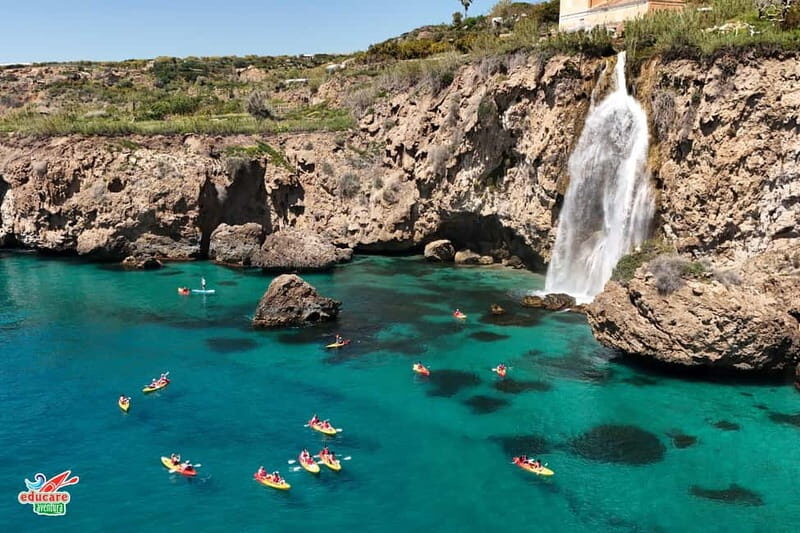 Nerja: Self-Guided Kayak Tour. Maro Waterfall. Support boat for the route. - A Deep Dive into the Nerja Kayak Experience