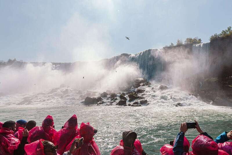 Niagara Falls, Canada: First Boat Cruise & Behind Falls Tour - Key Points