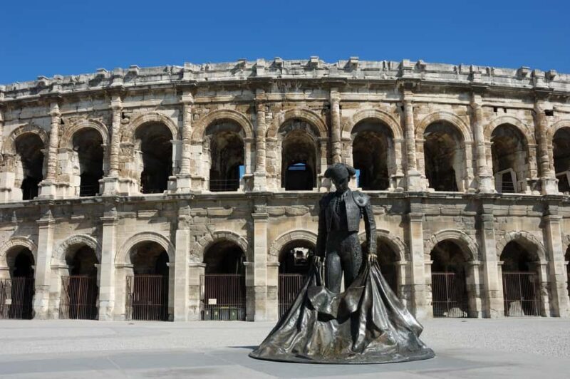 Nimes: Ancient Roman Arena Ticket & Old Town Audio Tour - The Experience in Detail