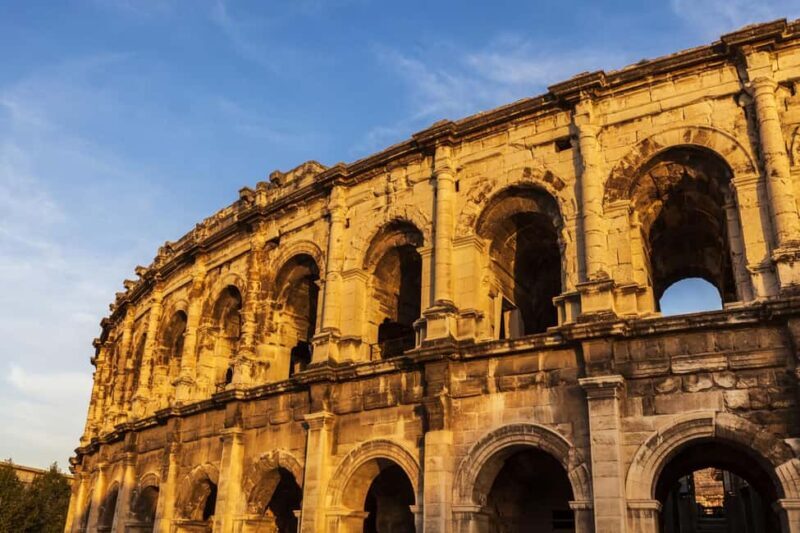 Nimes: Ancient Roman Arena Ticket & Old Town Audio Tour - The Sum Up