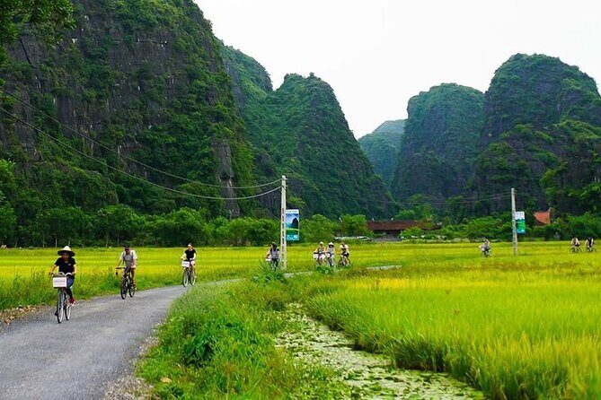 Ninh Binh Day Tour Tam Coc Mua Cave Hoa Lu Buffet Lunch Limousine - The Sum Up