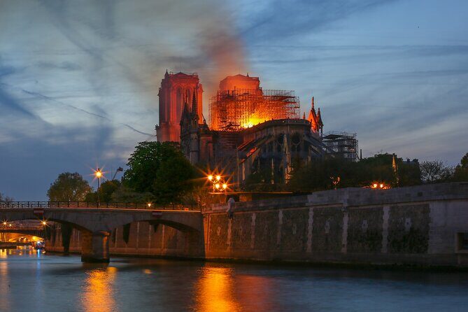 Notre Dame Cathedral Exterior Guided Walking Tour - Key Points