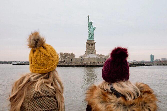 NYC Night Bus Sightseeing Tour with Free Statue of Liberty Cruise - The Sum Up