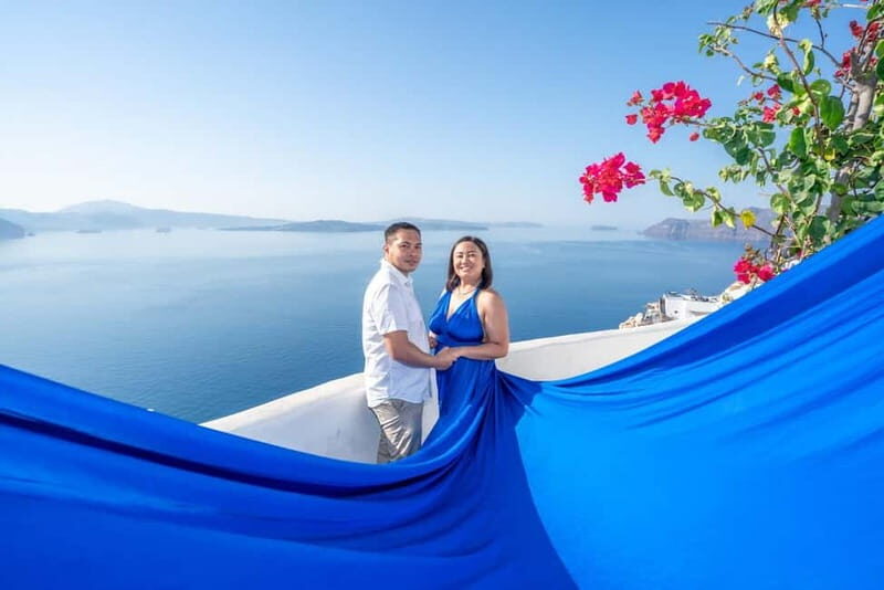 Oia: Santorini Photoshoot with Flying Dress Rental Option - The Sum Up