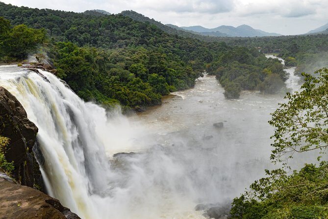 One day trip to Athirapally waterfall and Cherai beach to Kochi. - Athirappilly Waterfalls: Kerala’s Largest Cascade