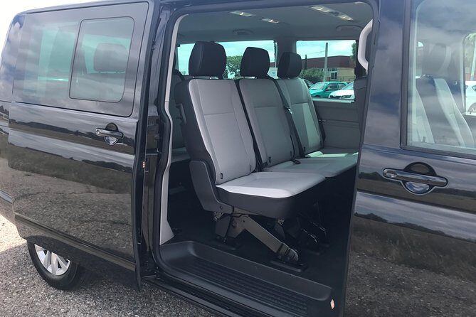 One-way transfer by minivan from Seville Airport to hotel in Seville Center - Key Points