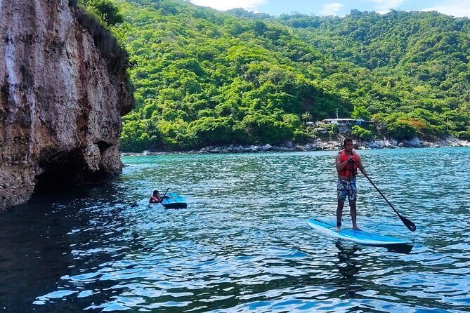 Paddleboard adventure to the arches of Mismaloya - The Sum Up