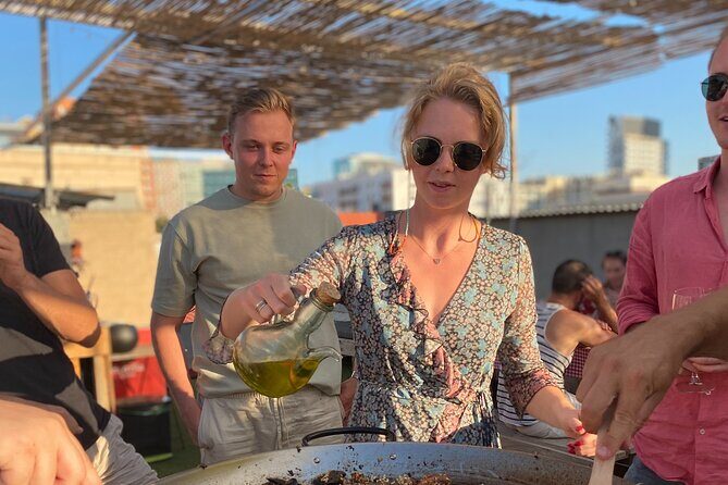 Paella Master Class in a Charming Rooftop Kitchen - Practical Tips for Your Booking