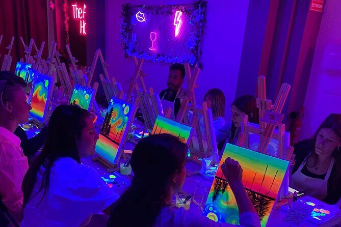 Paint a neon fluorescent picture while drinking unlimited wine - Key Points