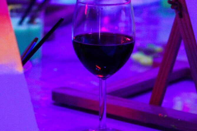 Paint a neon fluorescent picture while drinking unlimited wine - The Value of the Experience