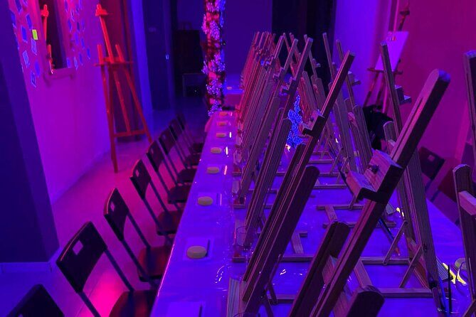 Paint a neon fluorescent picture while drinking unlimited wine - The Sum Up