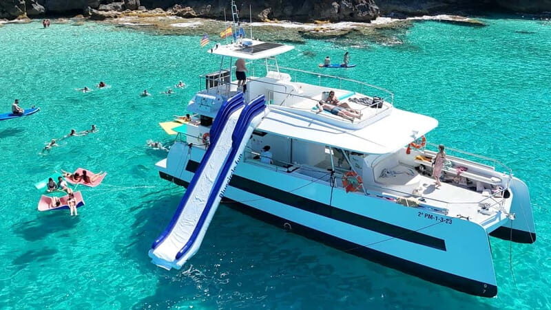 Palma: Deluxe Catamaran with Snacks, Drink, SUP & Snorkeling - Key Points